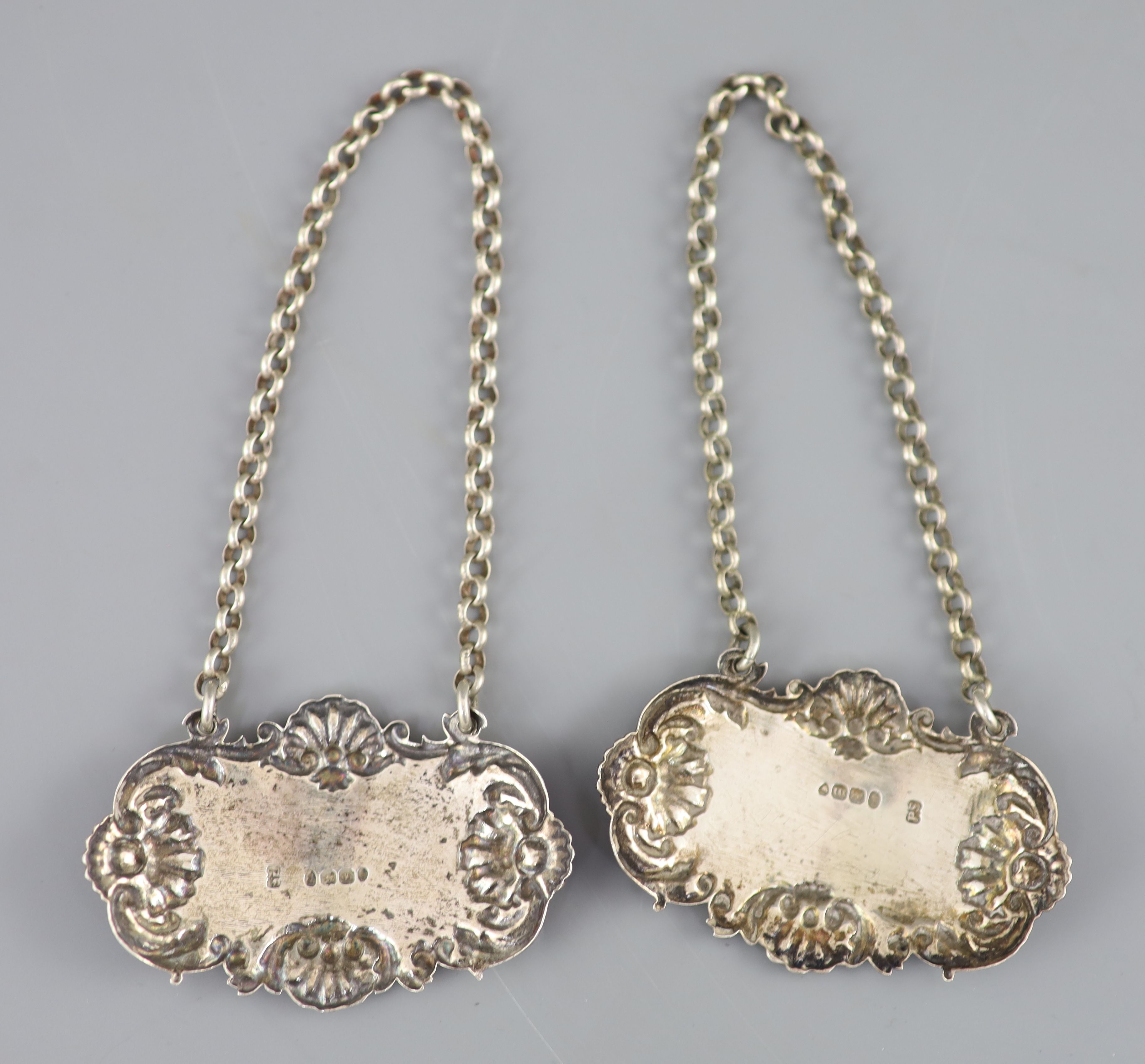 A pair of George IV silver wine labels Hollands & Brandy by Paul Storr, London, 1827, 64mm & 2 others.